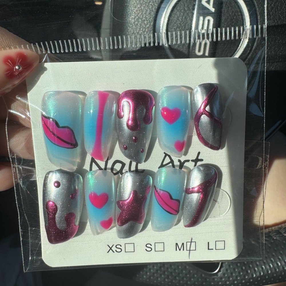 Colorful Nail Art Set with Pink and Silver Designs